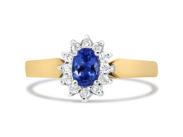 14K Yellow Gold 1/5 Cttw Round Diamond and 6x4mm Oval Blue Tanzanite Halo Ring (H-I Color, I1-I2 Clarity) - Size 7.75