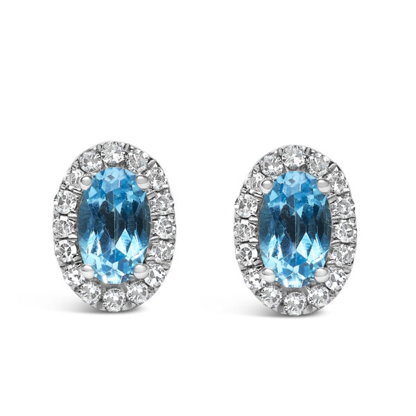 10K White Gold 5x3 MM Oval Blue Topaz and Diamond Halo Stud Earrings (I-J Color, I1-I2 Clarity)